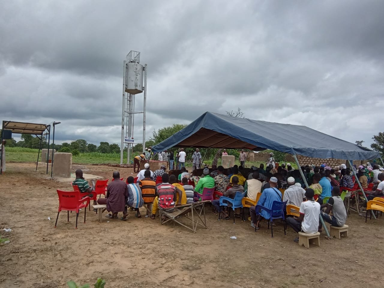Community gathered for a borehole dedication