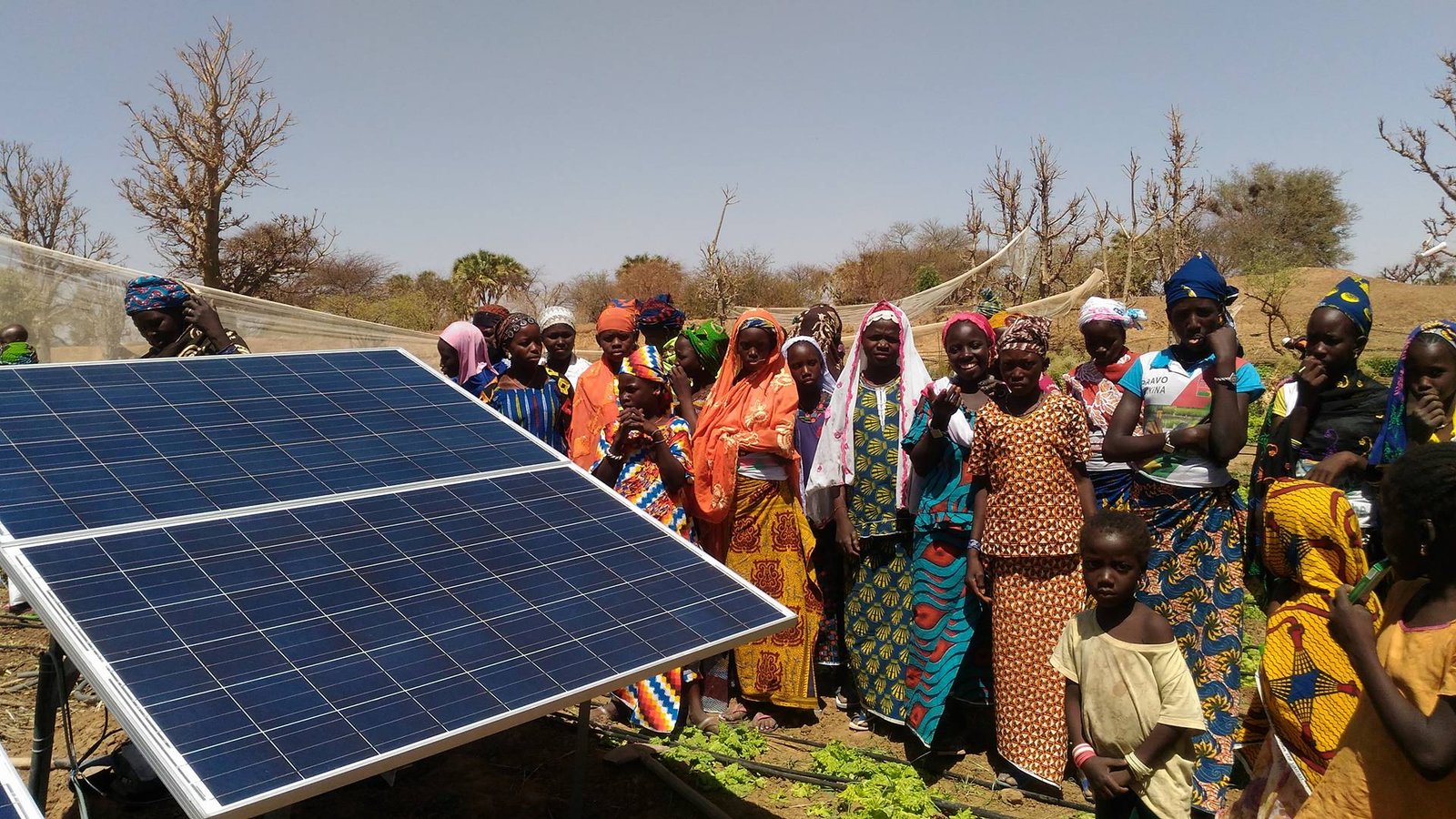 Solar-powered drip irrigation with community members in Burkina Faso